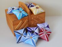 handcrafted stained glass effect pin cushions with button feature