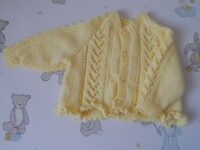 baby's cardigan in yellow