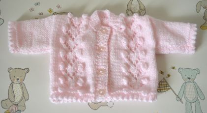 B085 baby cadigan pink bobble front