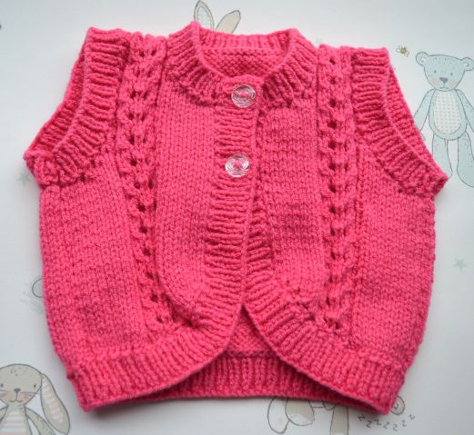 B388 baby cardigan sleeveless fuschia baby cardigan sleeveless fuschia
