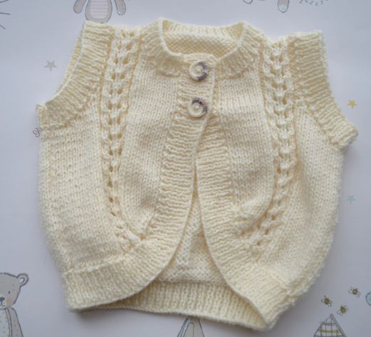 B423 baby cardigan sleeveless cream baby cardigan sleeveless cream