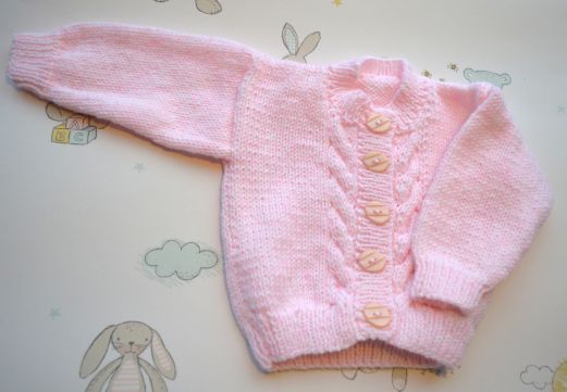 B295 baby cardigan pink cable front