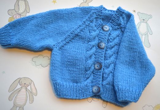 B367 baby cardigan blue cable front