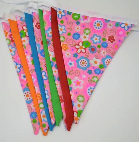 H418 Bunting fabric pink based flowers and plain