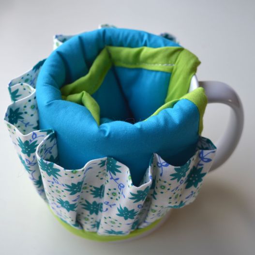H537 mug organiser turquoise green flowers lime